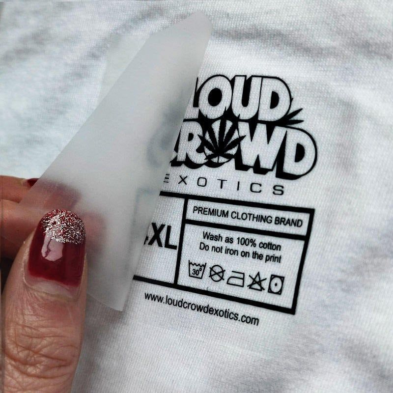 Custom heat transfer label with care instructions for clothing brand Loud Crowd Exotics — Pro Packaging
