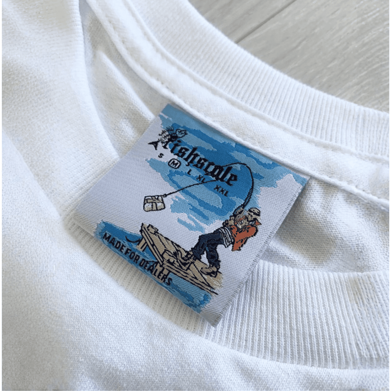 Custom woven label sewn into garment collar for clothing brand Fishscale — Pro Packaging